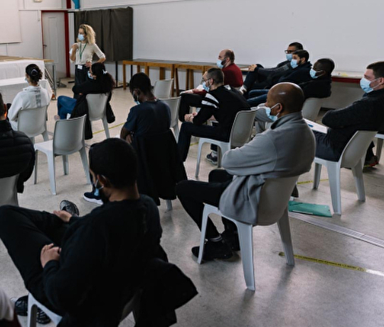 Detenu·es assistants à la conférence